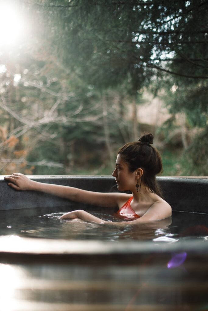 woman in hot tub during daytime, ideas for long narrow gardens